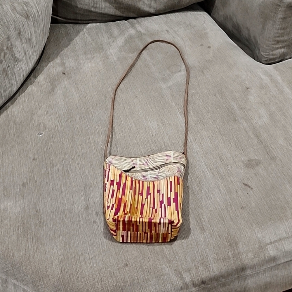 Narrow bucket crossbody bag